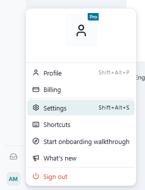 Profile menu open from the avatar at the bottom of the sidebar, with 'Settings' and its shortcut highlighted