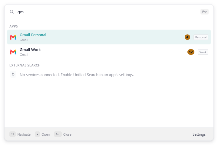 The Apps section after typing 'gm': two Gmail apps with unread badges and workspace tags on the right, and the External search note 'No services connected. Enable Unified Search in an app's settings.'