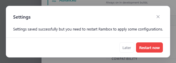 The notification 'Settings saved successfully but you need to restart Rambox to apply some configurations.' with 'Restart now' and 'Later'
